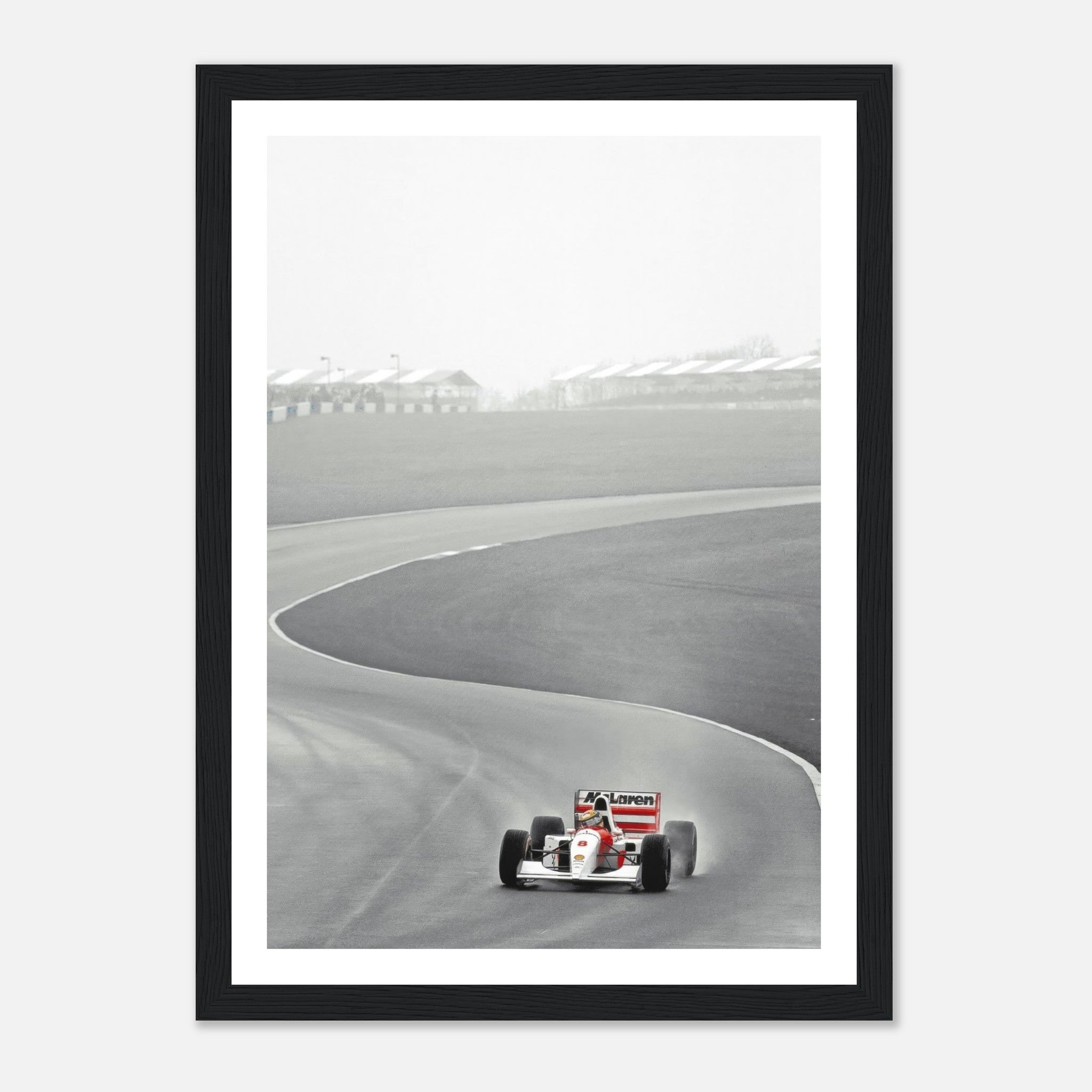 1988 Ayrton Senna McLaren MP4/4 framed print capturing a classic moment in Formula 1 racing history.