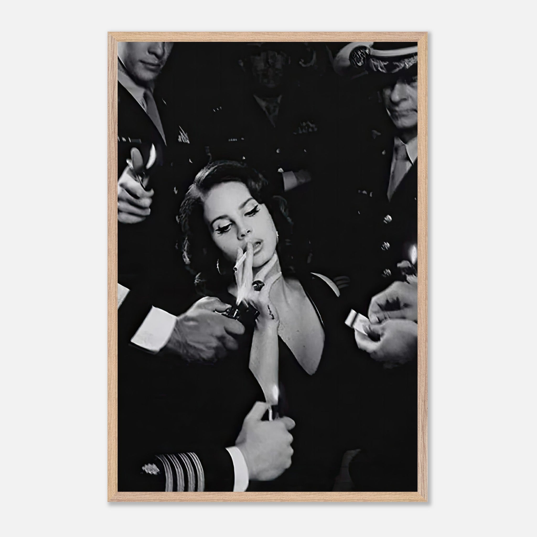 Vintage black-and-white framed print of Lana Del Ray smoking, surrounded by admirers in military uniforms.