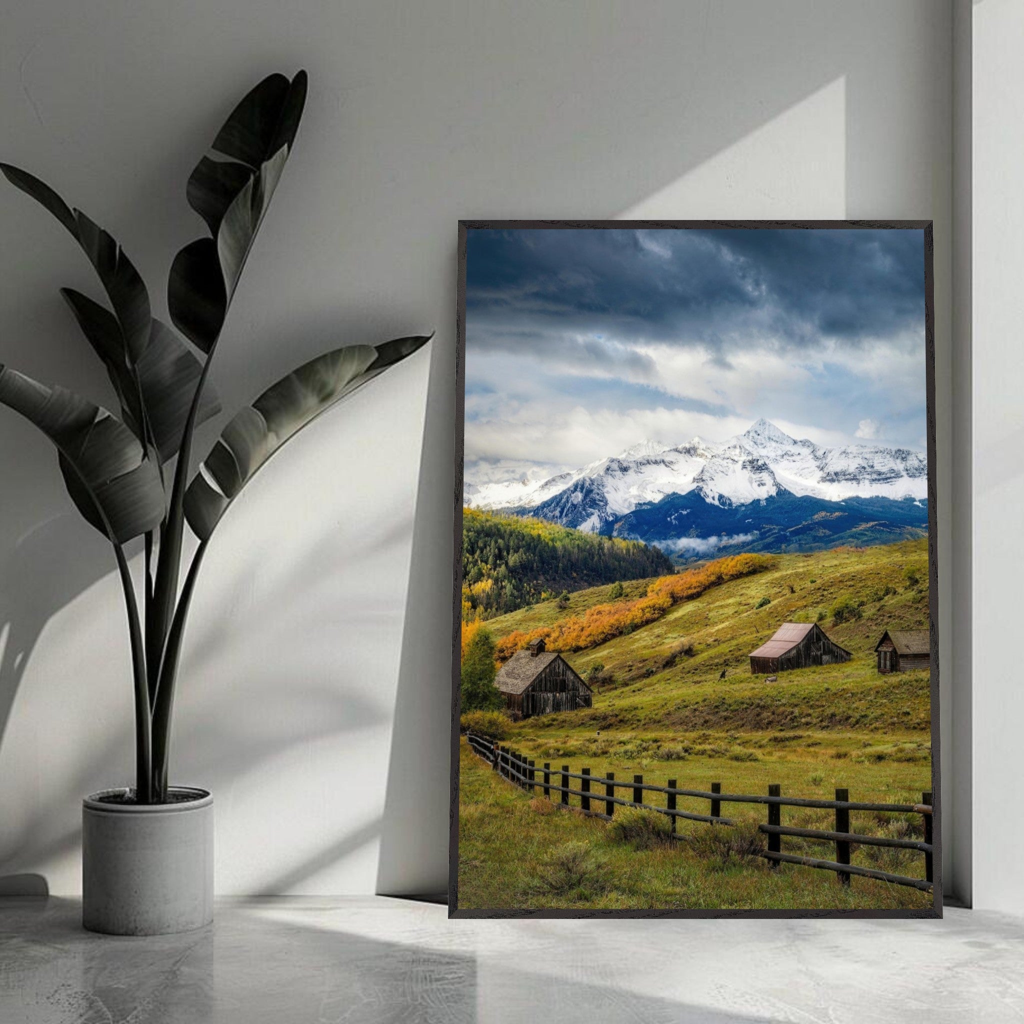 Framed Giclée fine art print of Telluride, Colorado with rustic barns and snow-capped peaks in a serene landscape.