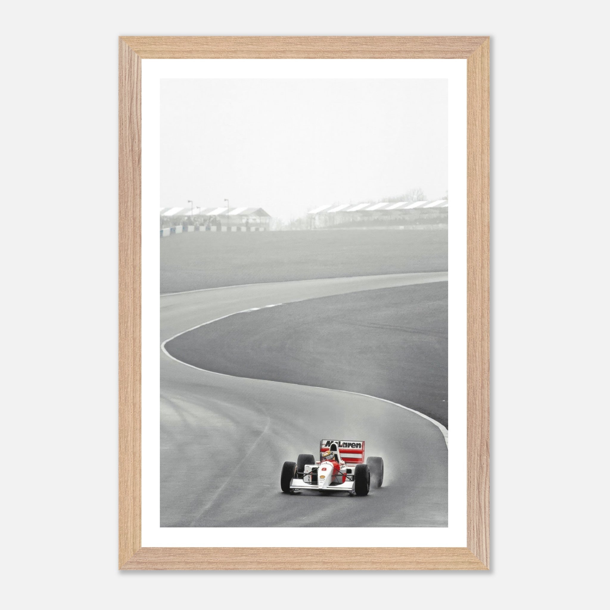 Framed Giclée fine art print of Ayrton Senna driving the McLaren MP4/4 on a racetrack in 1988.