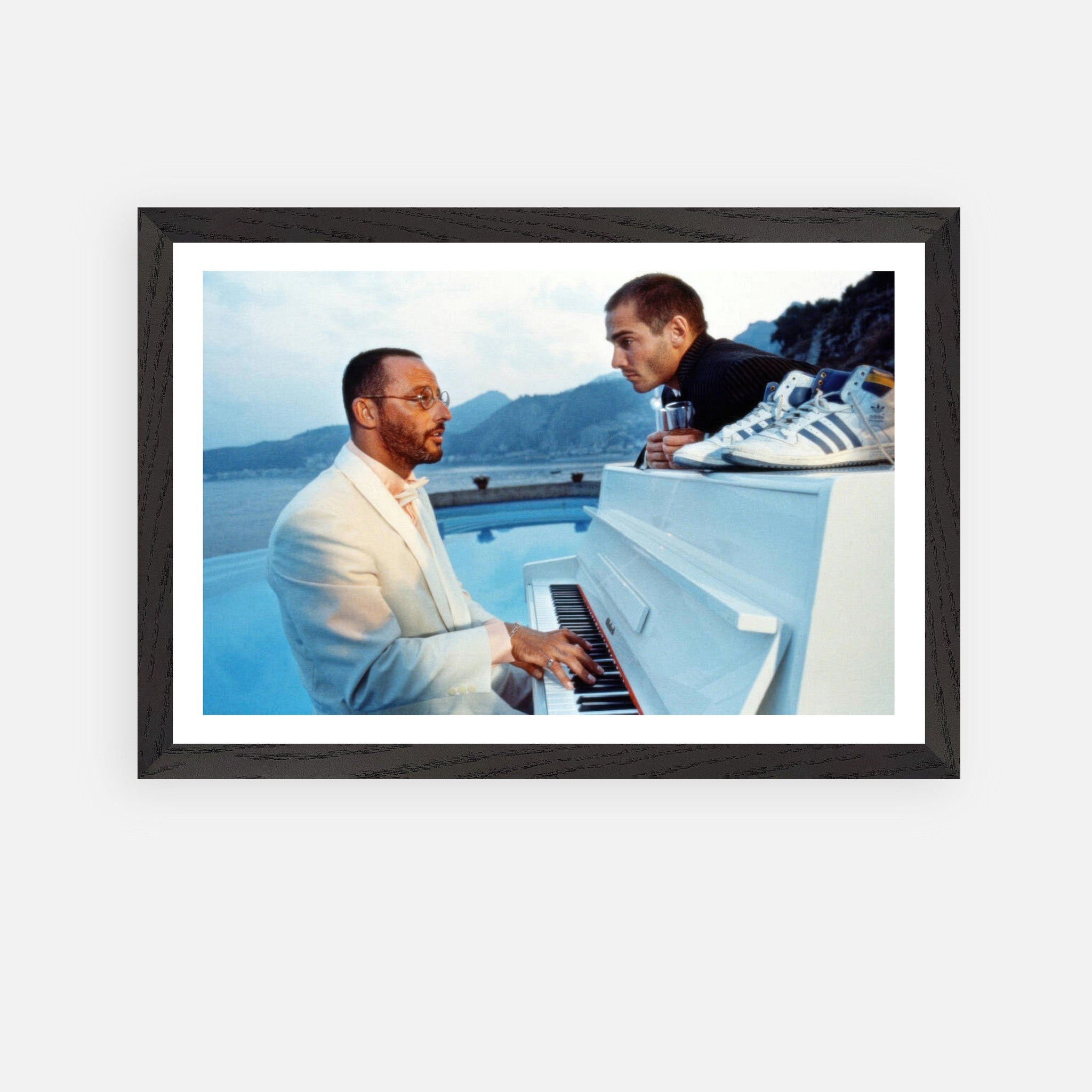 Jean Reno Piano fine art print featuring an iconic coastal piano performance scene from *The Big Blue*.