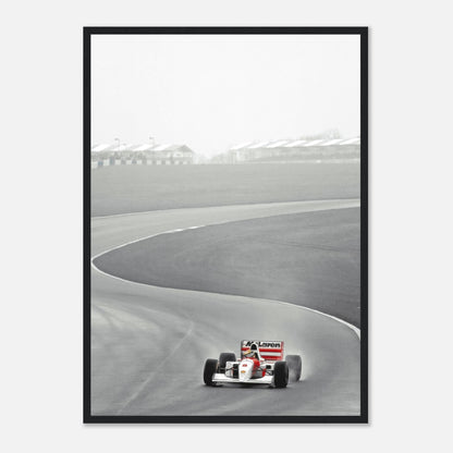 1988 Ayrton Senna driving McLaren MP4/4 on racetrack in black and white framed photography print.