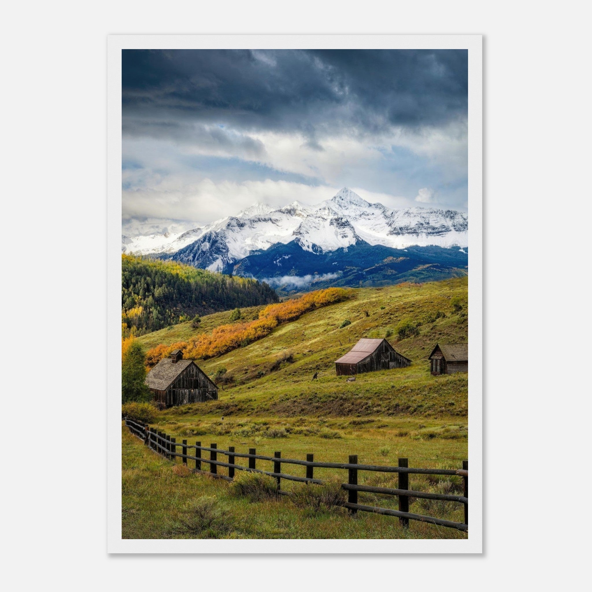 Framed print of Telluride, Colorado showcasing rustic barns and snow-capped mountains in vibrant autumn colors.