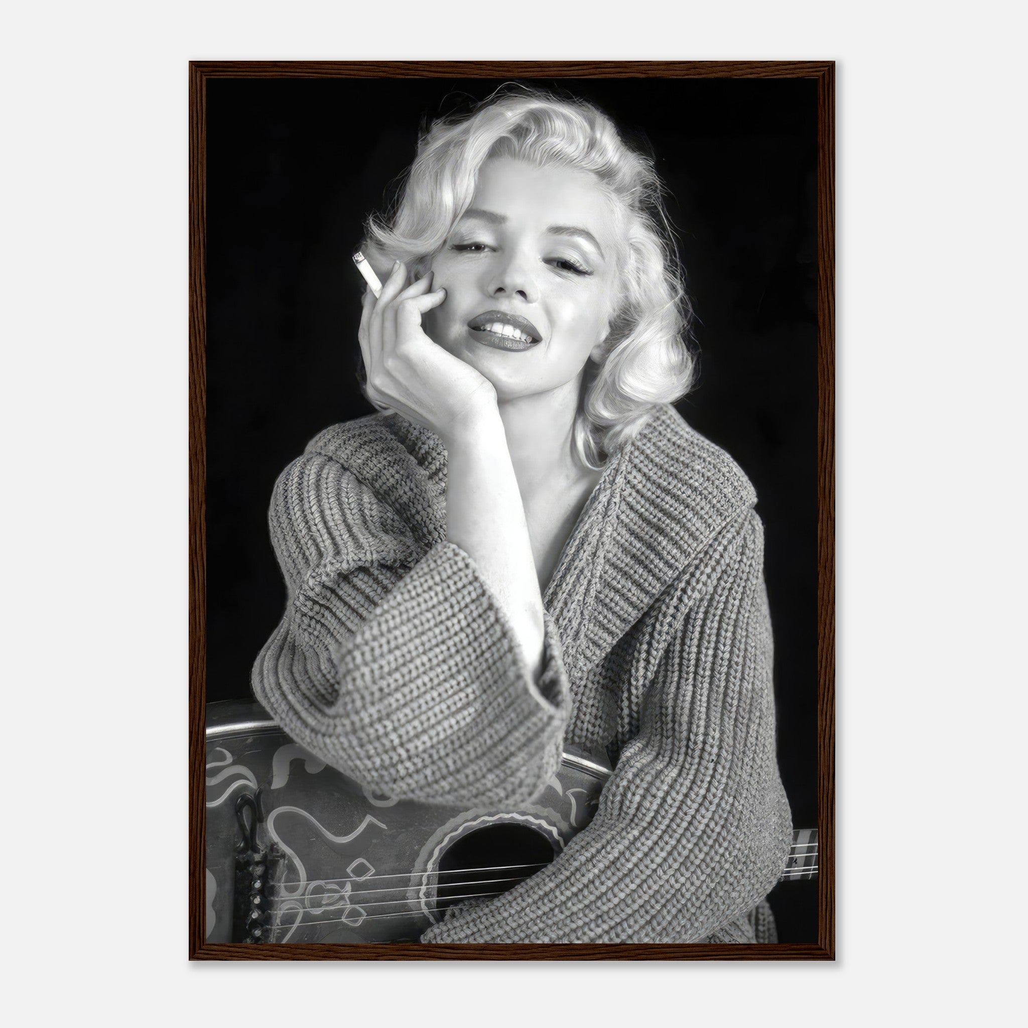 Marilyn Monroe smoking in a cozy sweater, framed black-and-white poster showcasing timeless elegance and allure.