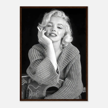 Marilyn Monroe smoking in a cozy sweater, framed black-and-white poster showcasing timeless elegance and allure.