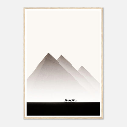 Framed print of the Pyramids of Giza with silhouette of camels, capturing Egypt's majestic desert landscape.