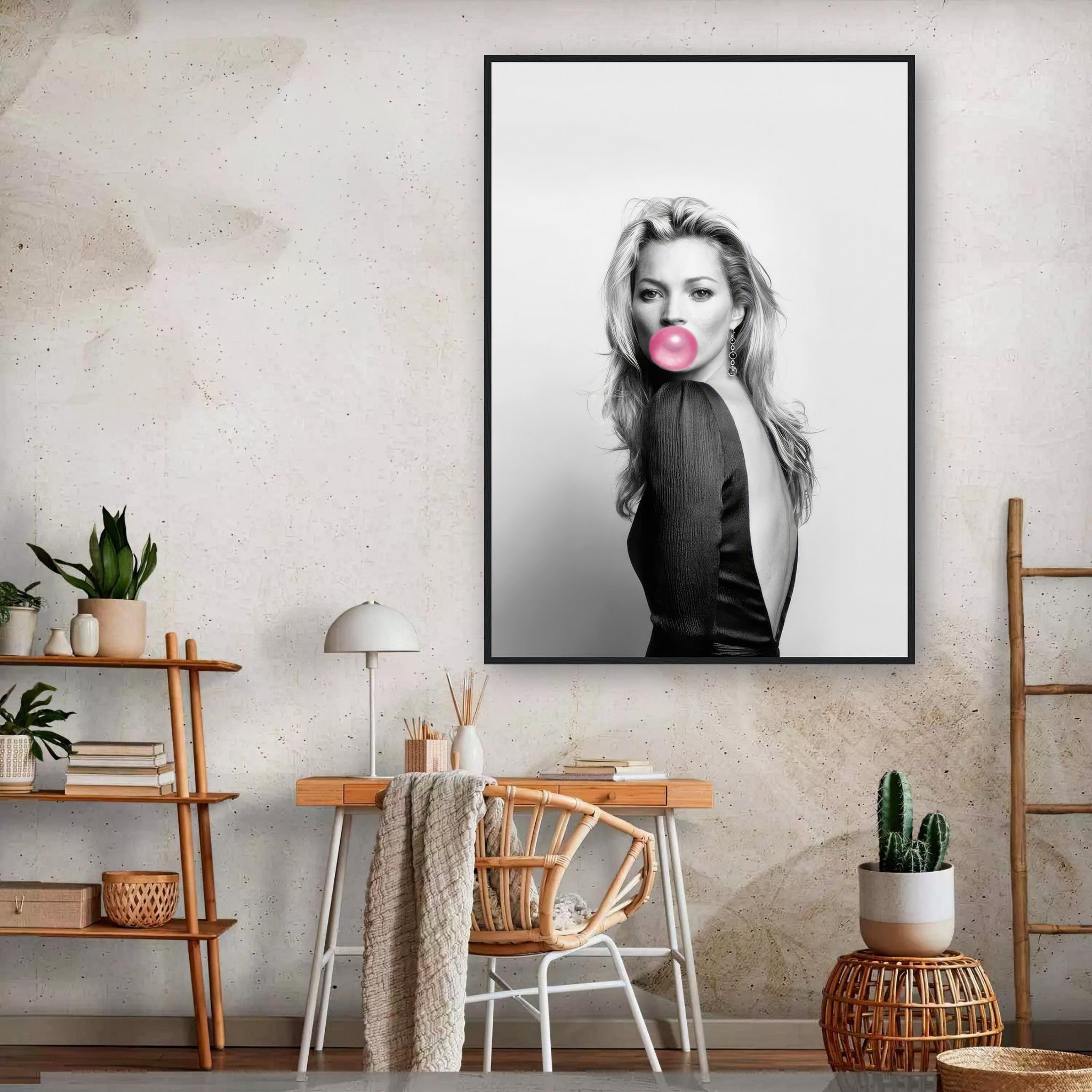 Framed print of Kate Moss blowing bubble gum in a stylish modern interior setting.