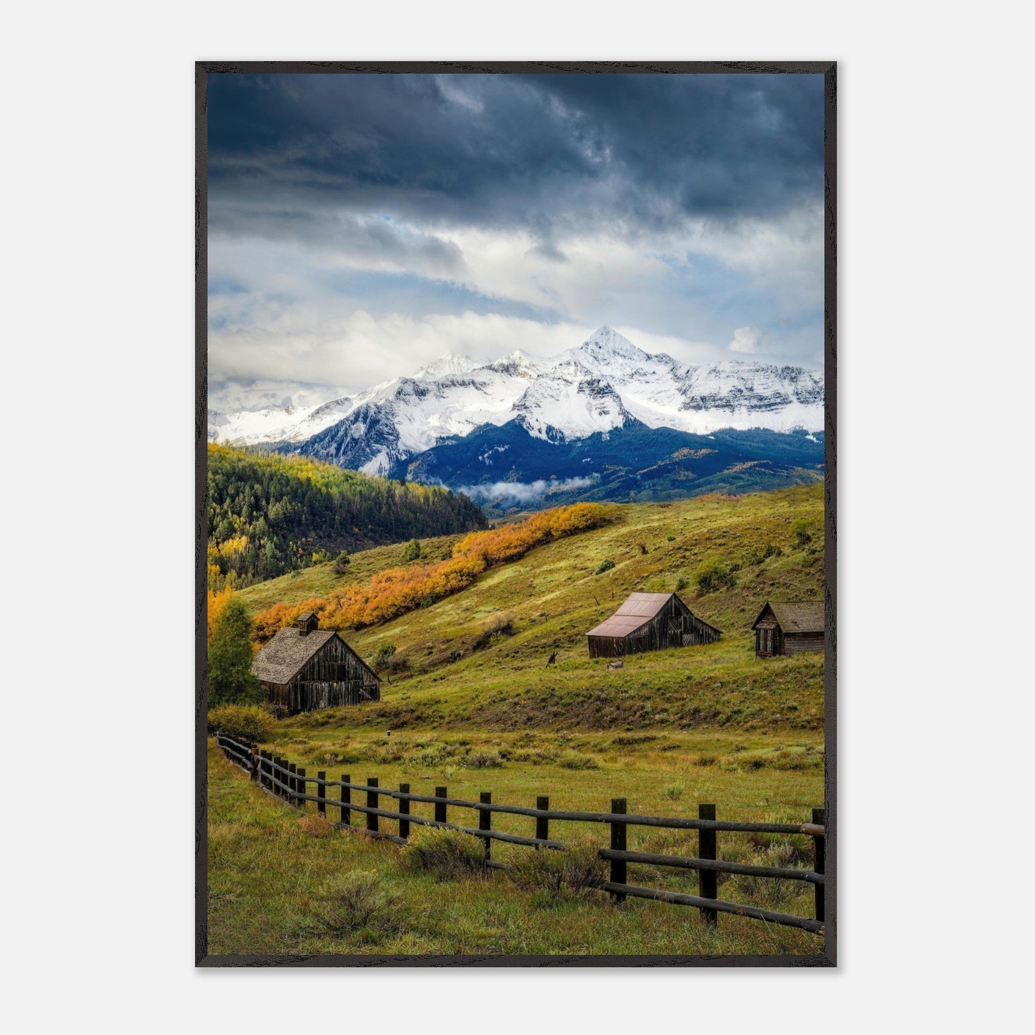 Framed Giclée fine art of Telluride, Colorado featuring barns and snow-capped mountains in vibrant colors.