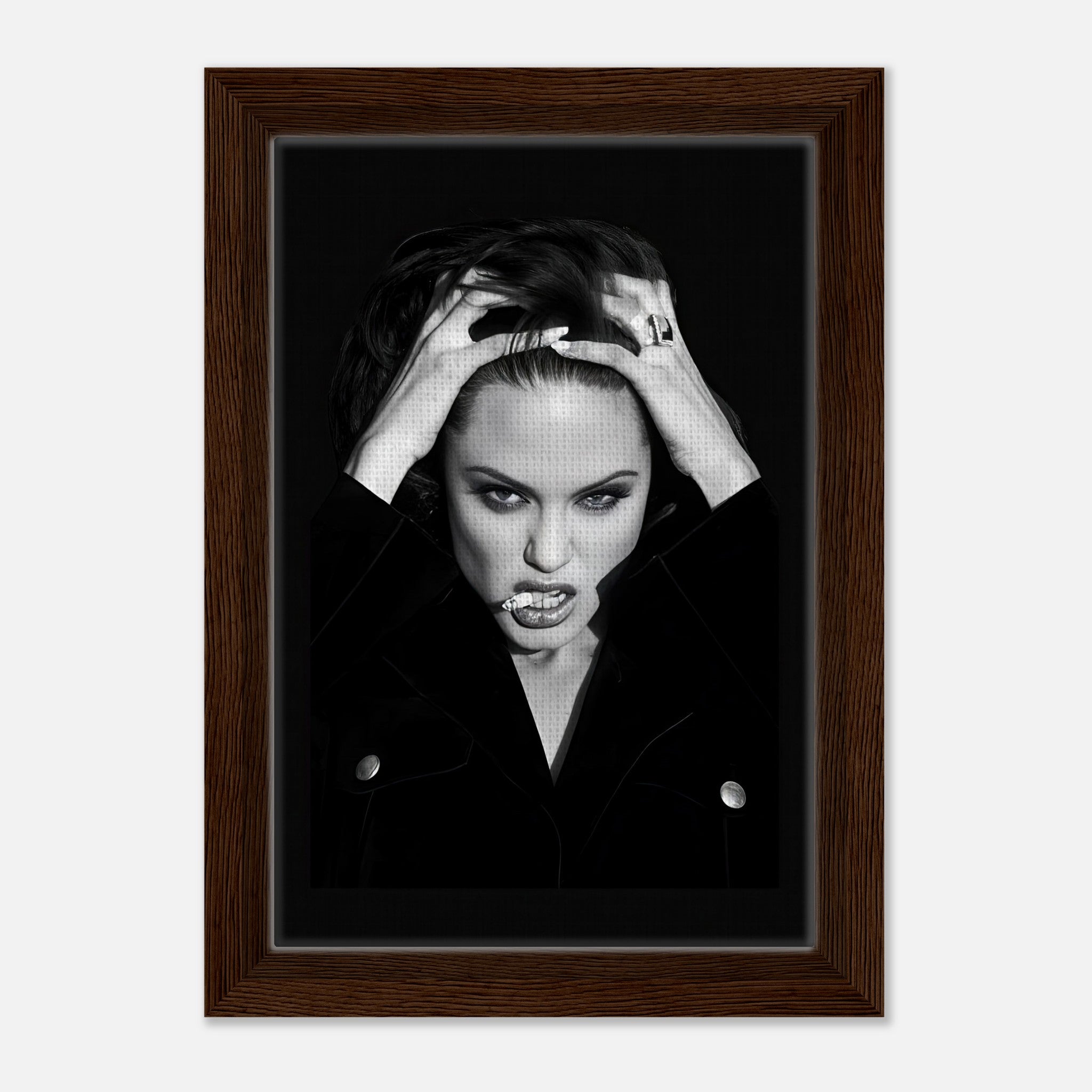 Angelina Jolie smoking artwork in a sleek wooden frame, showcasing elegance and rebellion in bold black and white.