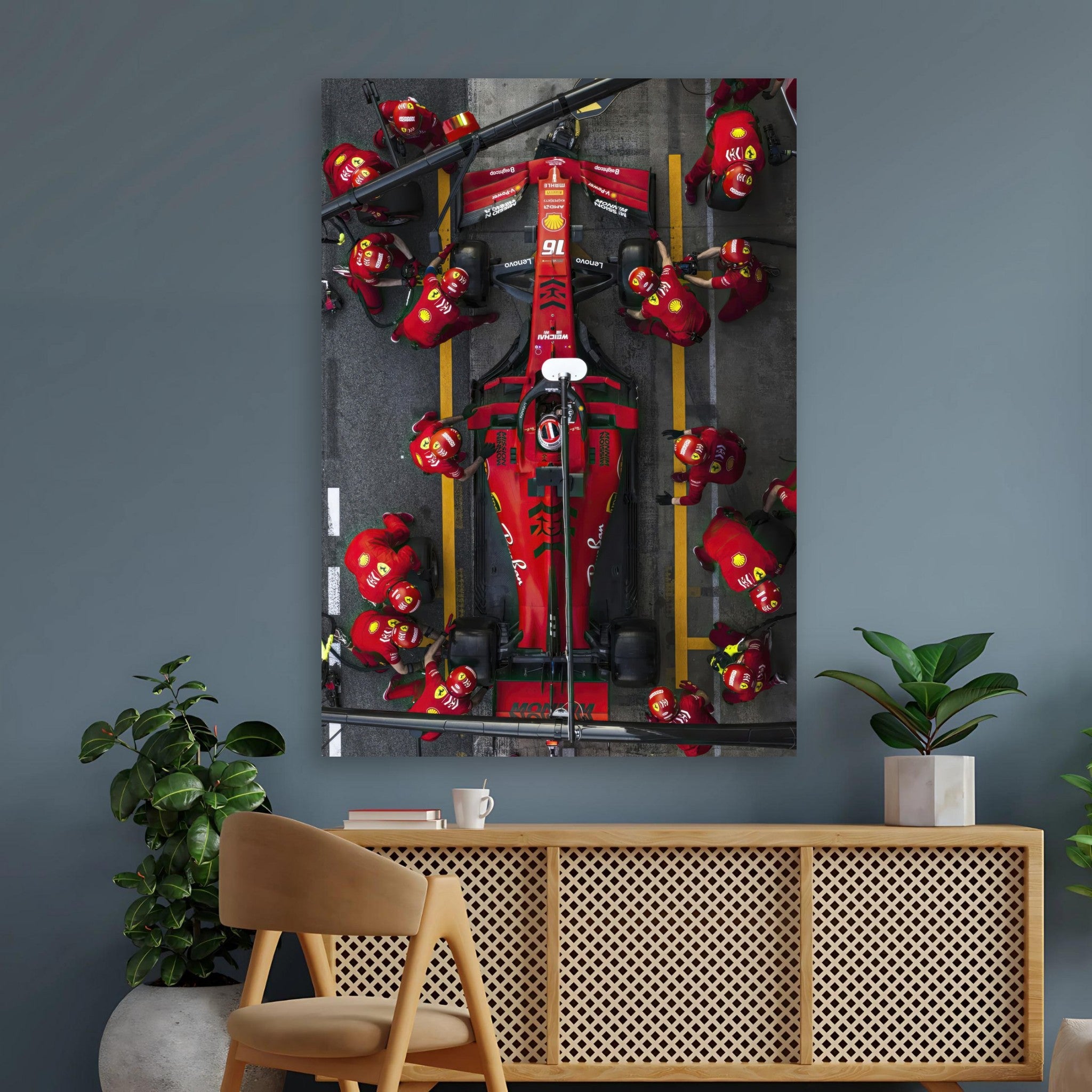 Ferrari Formula 1 pitstop poster featuring team members in action, vibrant colors, and high-resolution quality for dynamic wall decor.