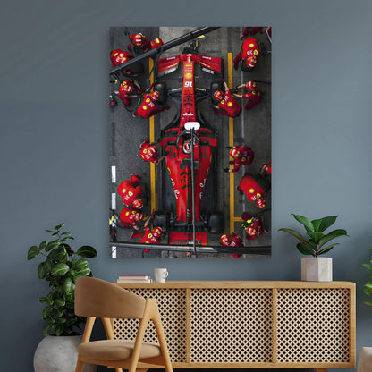 Ferrari Formula 1 pitstop poster featuring team members in action, vibrant colors, and high-resolution quality for dynamic wall decor.