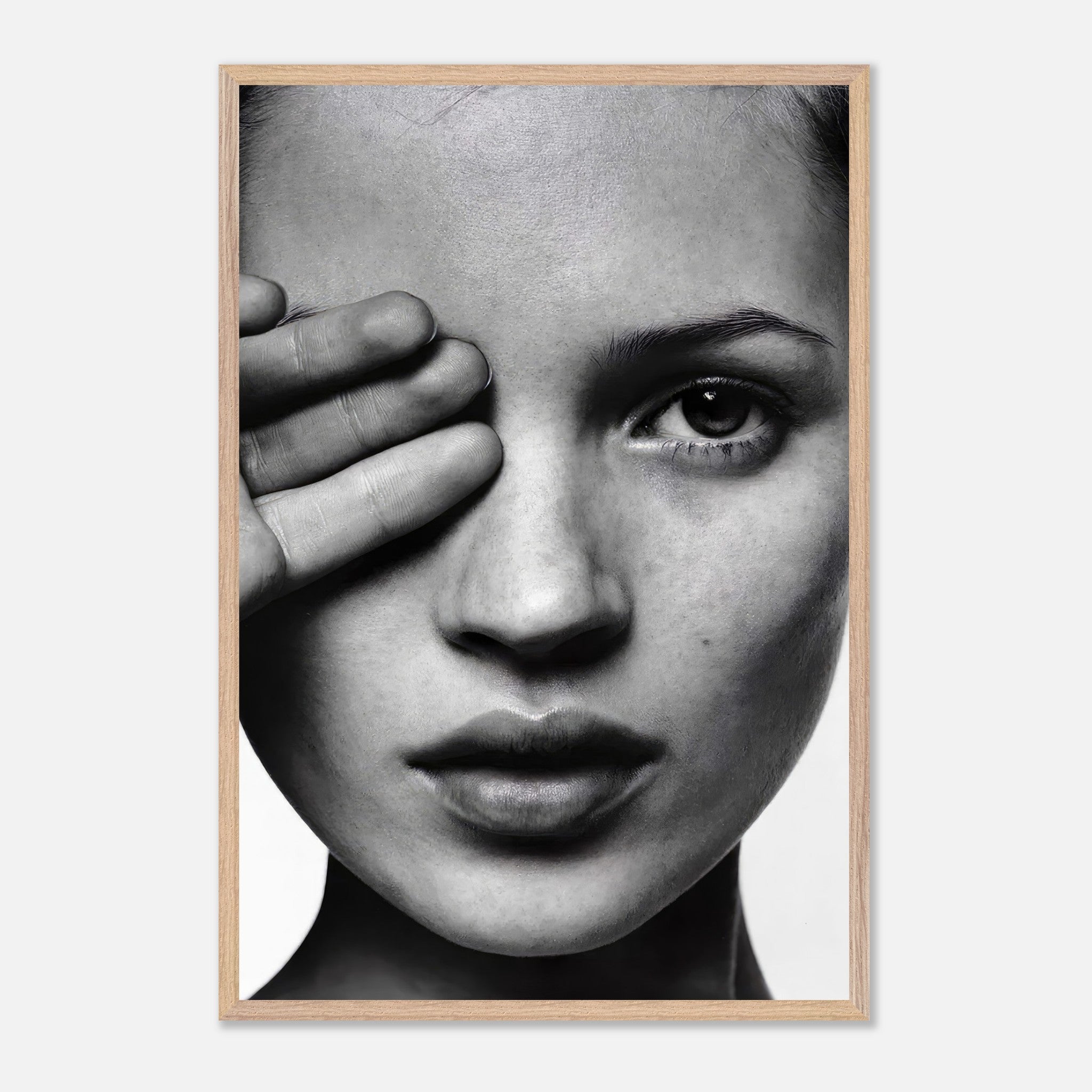 Kate Moss black and white photography framed print, showcasing a striking close-up portrait for vintage decor.