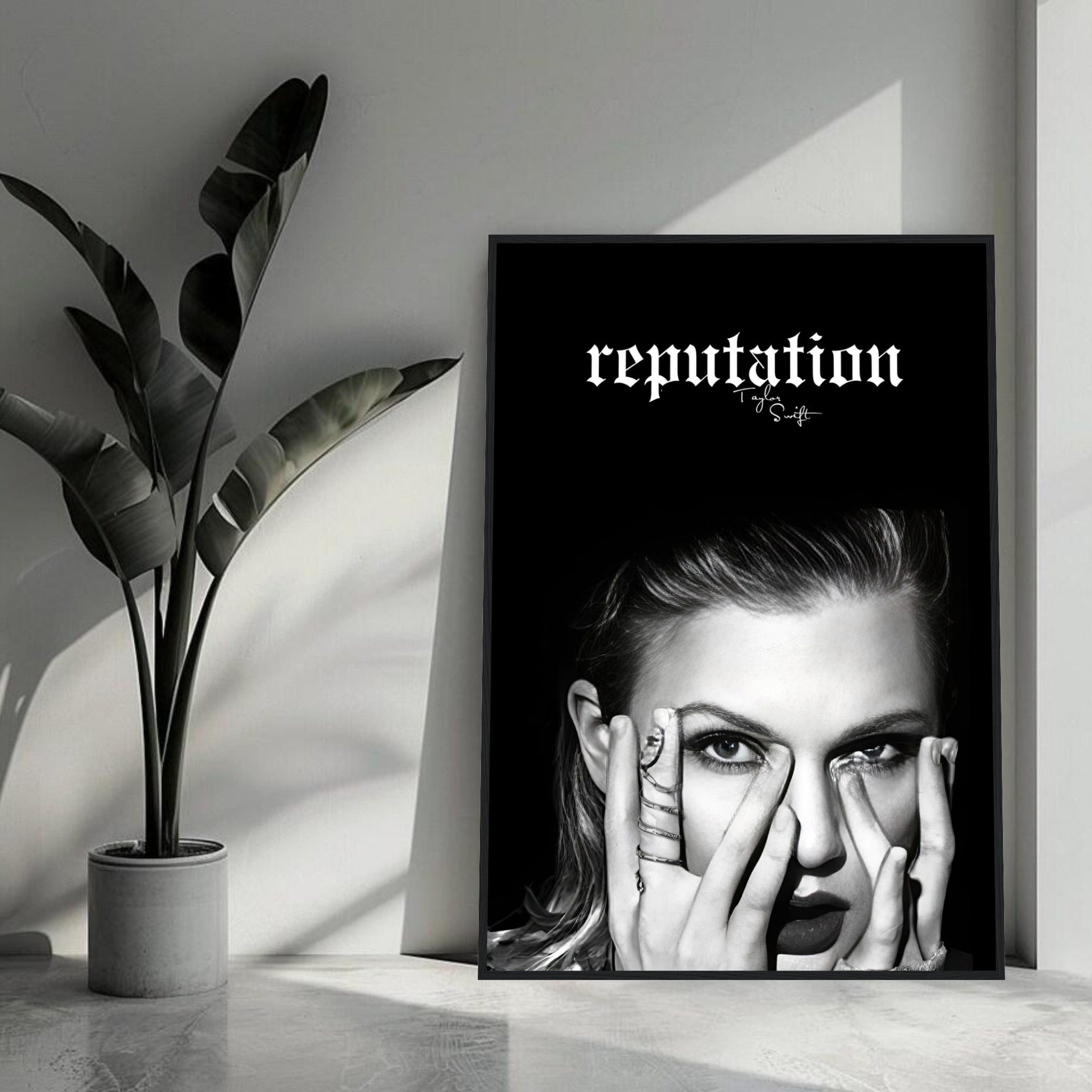 Taylor Swift Reputation framed print featuring bold black-and-white imagery of the artist, enhancing modern decor.