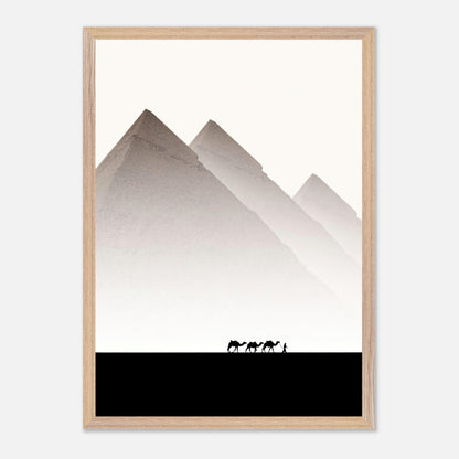 Framed Giclée print of the Pyramids of Giza with camels in silhouette against a minimalist background.