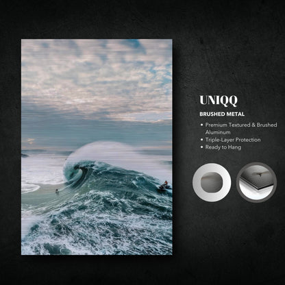 Big wave surfing brushed metal print showcasing a surfer riding a massive wave on premium aluminum.