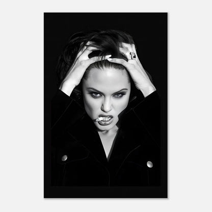 Black-and-white metal print of Angelina Jolie, evoking emotion and allure with striking contrast and sharp details.