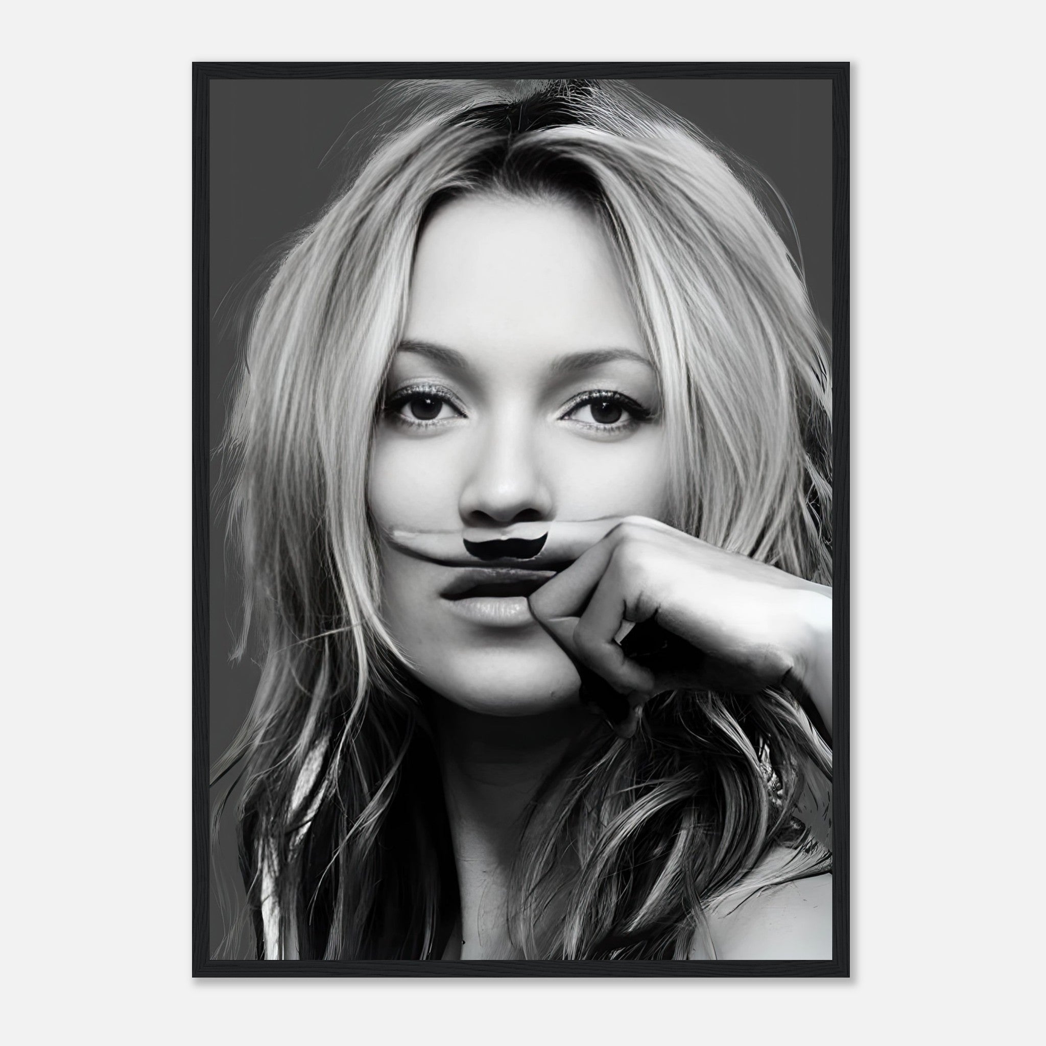 Kate Moss Mustache Framed Print featuring a striking black-and-white portrait with a whimsical mustache design.