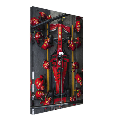 Ferrari Formula 1 pitstop canvas artwork, showcasing vibrant colors and intricate details of a racing team in action.