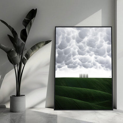 Toscana Italy framed print showcasing rolling green hills and elegant cypress trees under dramatic clouds.