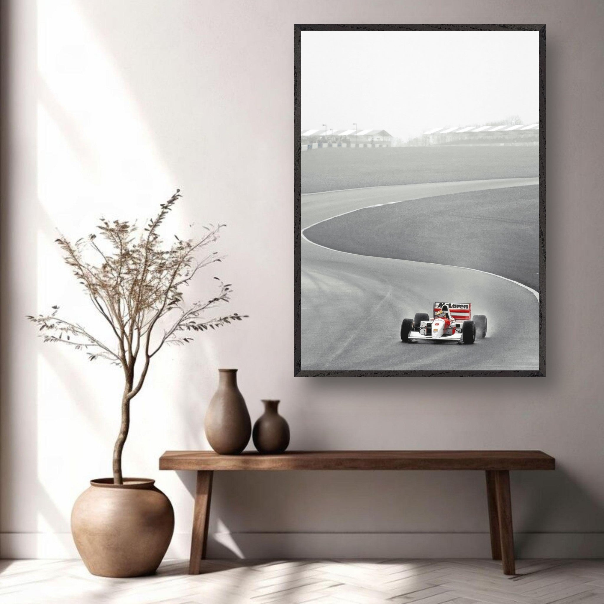 Vintage framed art of 1988 Ayrton Senna driving the McLaren MP4/4 on a race track, displayed in a stylish interior.