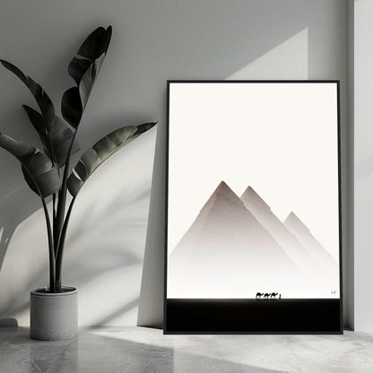 Framed print of the Pyramids of Giza in minimalist style, showcasing Egypt travel photography in a modern interior setting.