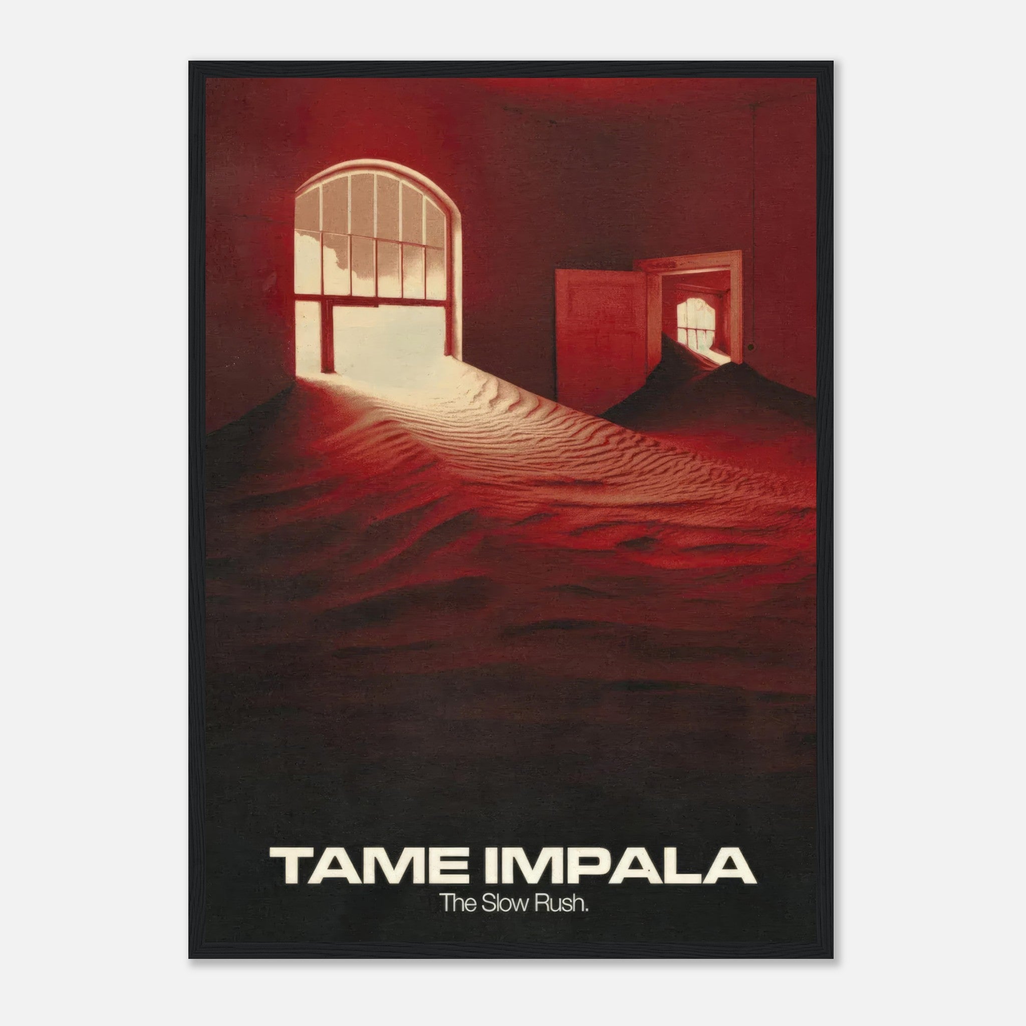 Framed print of Tame Impala's album *The Slow Rush*, featuring surreal sand dunes and warm red tones.