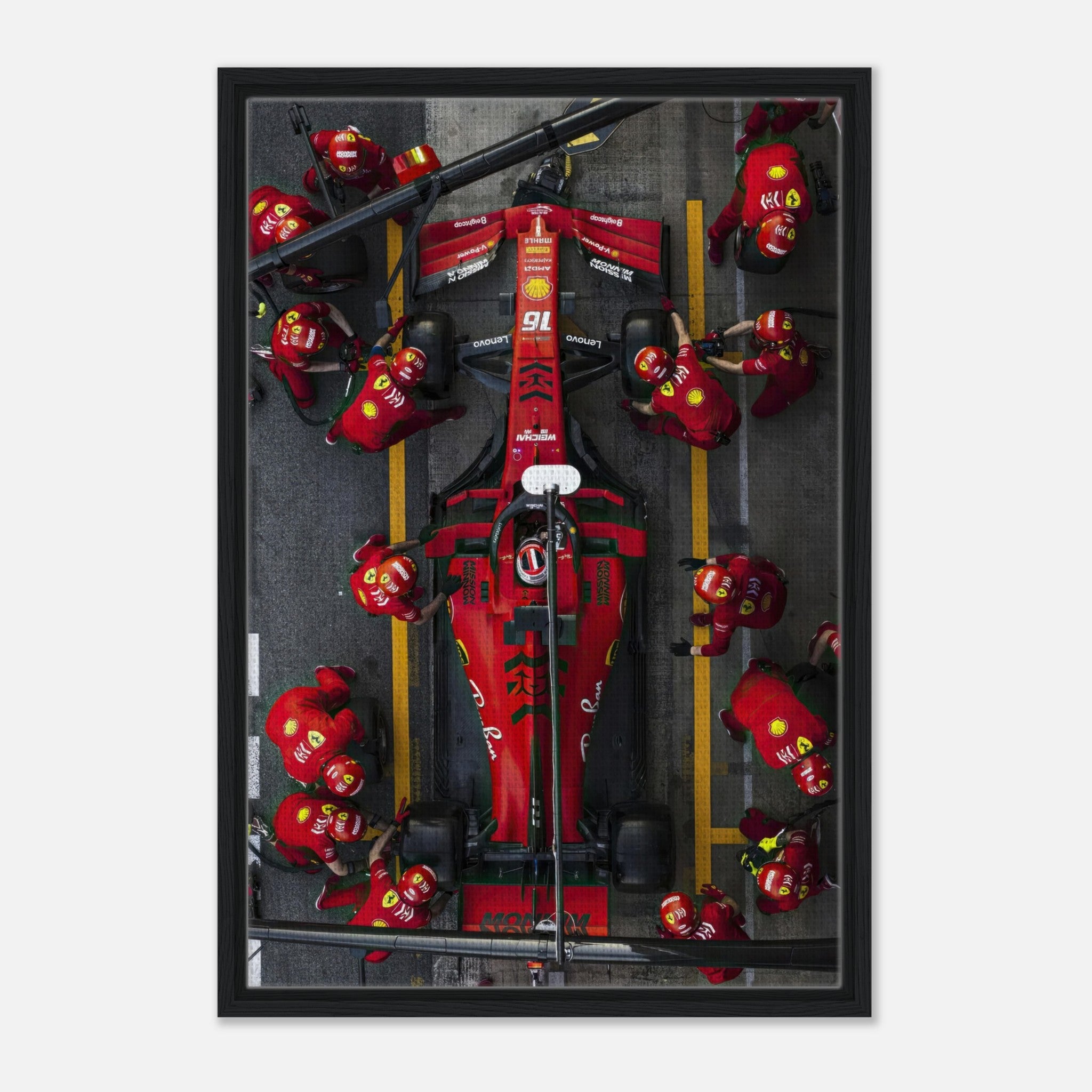 Ferrari Formula 1 pitstop framed canvas print showcasing dynamic crew action and vibrant colors in motorsport art.