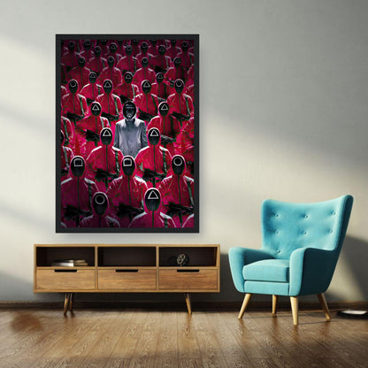 Framed print of Squid Game guards in pink uniforms, creating a dramatic and intense atmosphere in a modern living space.