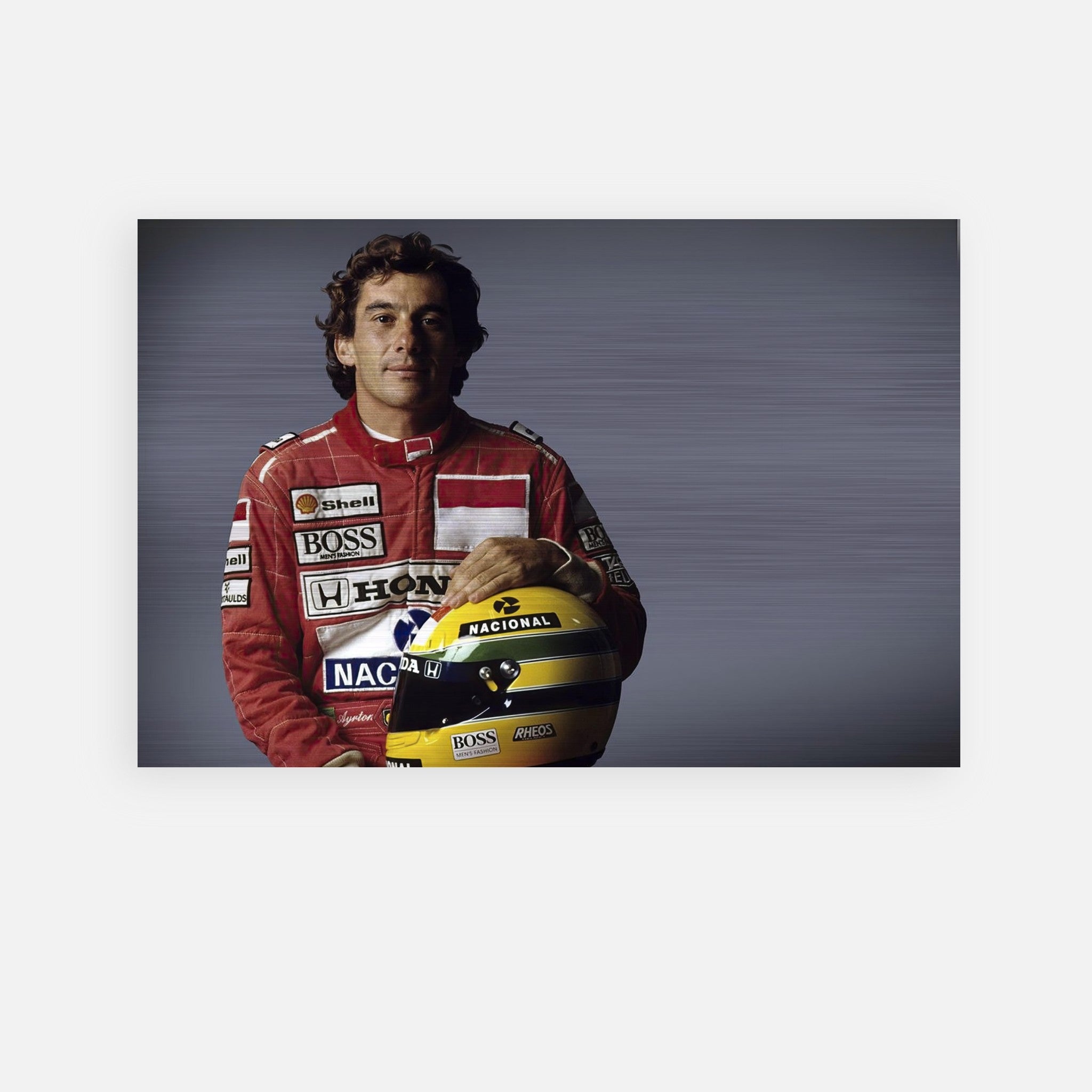 Ayrton Senna in racing suit with helmet, brushed metal print showcasing his legacy in motorsport.