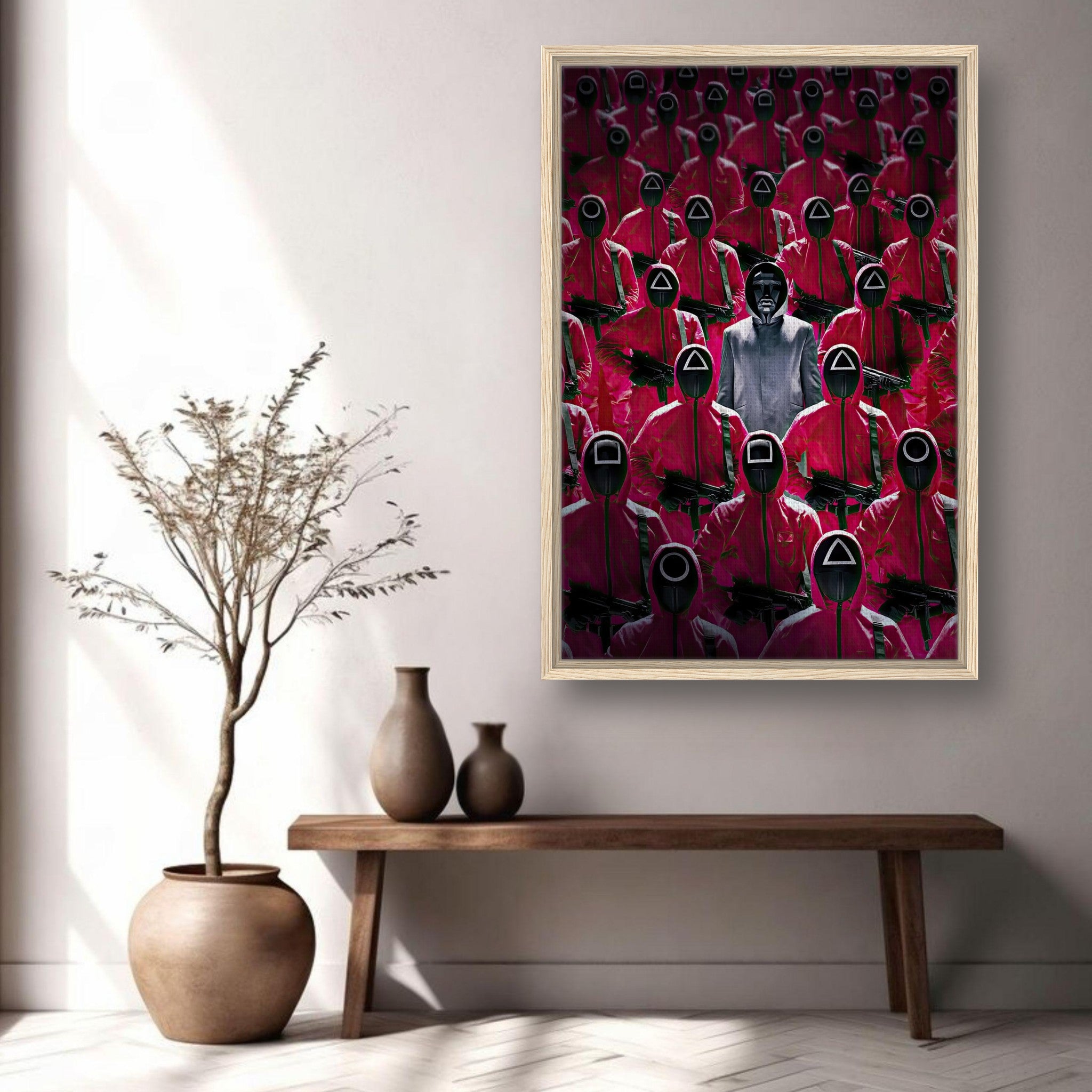 Framed canvas print of Squid Game guards in red uniforms with a mysterious figure, stylishly displayed in a modern interior.