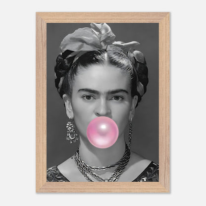 Frida Kahlo vintage framed art featuring black-and-white photo with pink bubble gum. Unique decor for art lovers.