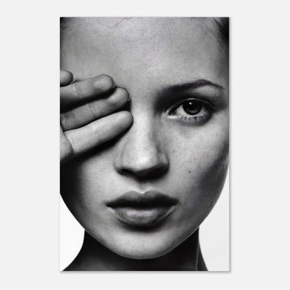 Black and white photograph of a woman covering one eye, showcasing elegance and striking beauty on a metal print.