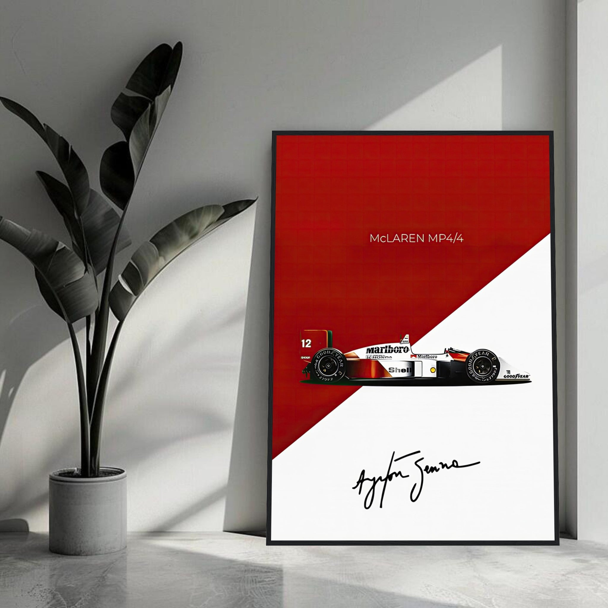 Ayrton Senna McLaren MP4/4 framed print featuring bold red and white design with Senna's signature.