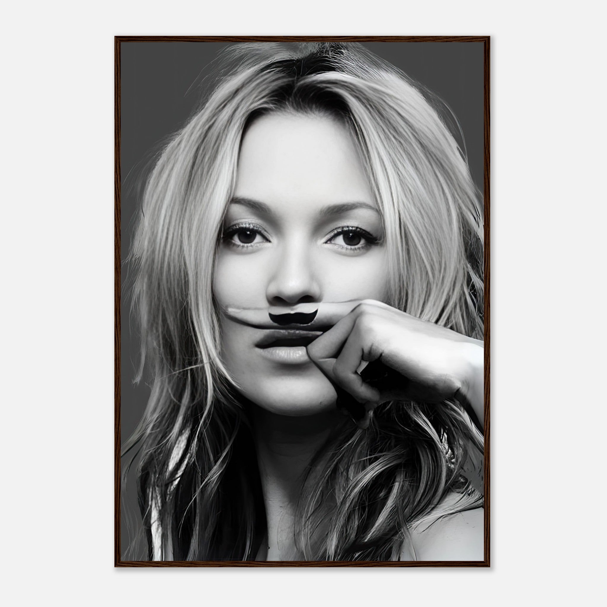 Black-and-white portrait of a woman with a whimsical mustache, framed, adding playful elegance to contemporary decor.