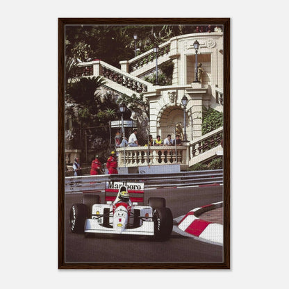 Framed canvas print of Ayrton Senna racing at Monaco, showcasing vibrant colors and dynamic motorsport artistry.