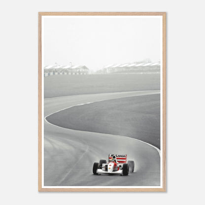 1988 Ayrton Senna McLaren MP4/4 vintage framed art capturing Formula 1 action on track.