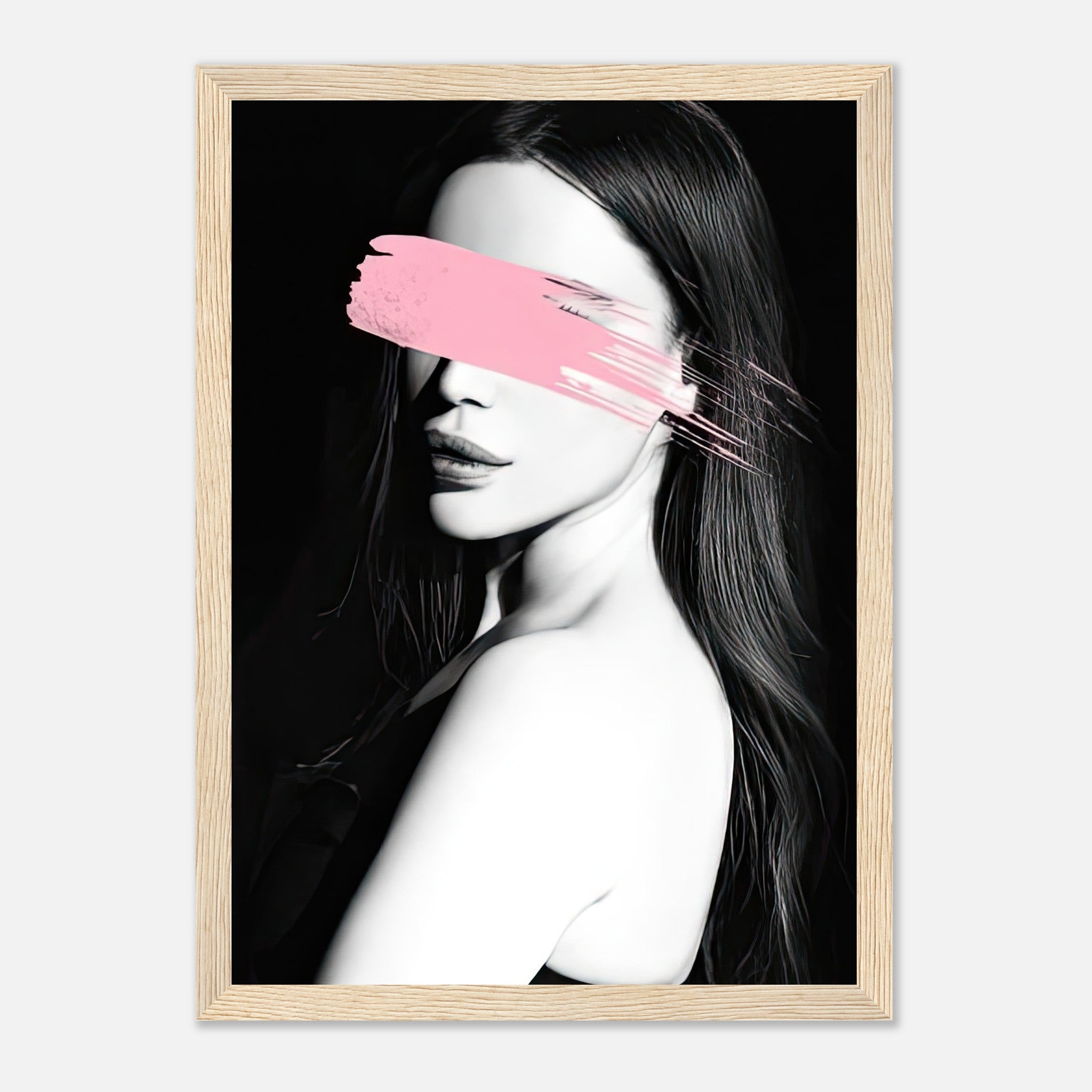 Framed print of a monochrome portrait with a bold pink brushstroke, adding modern sophistication to decor.