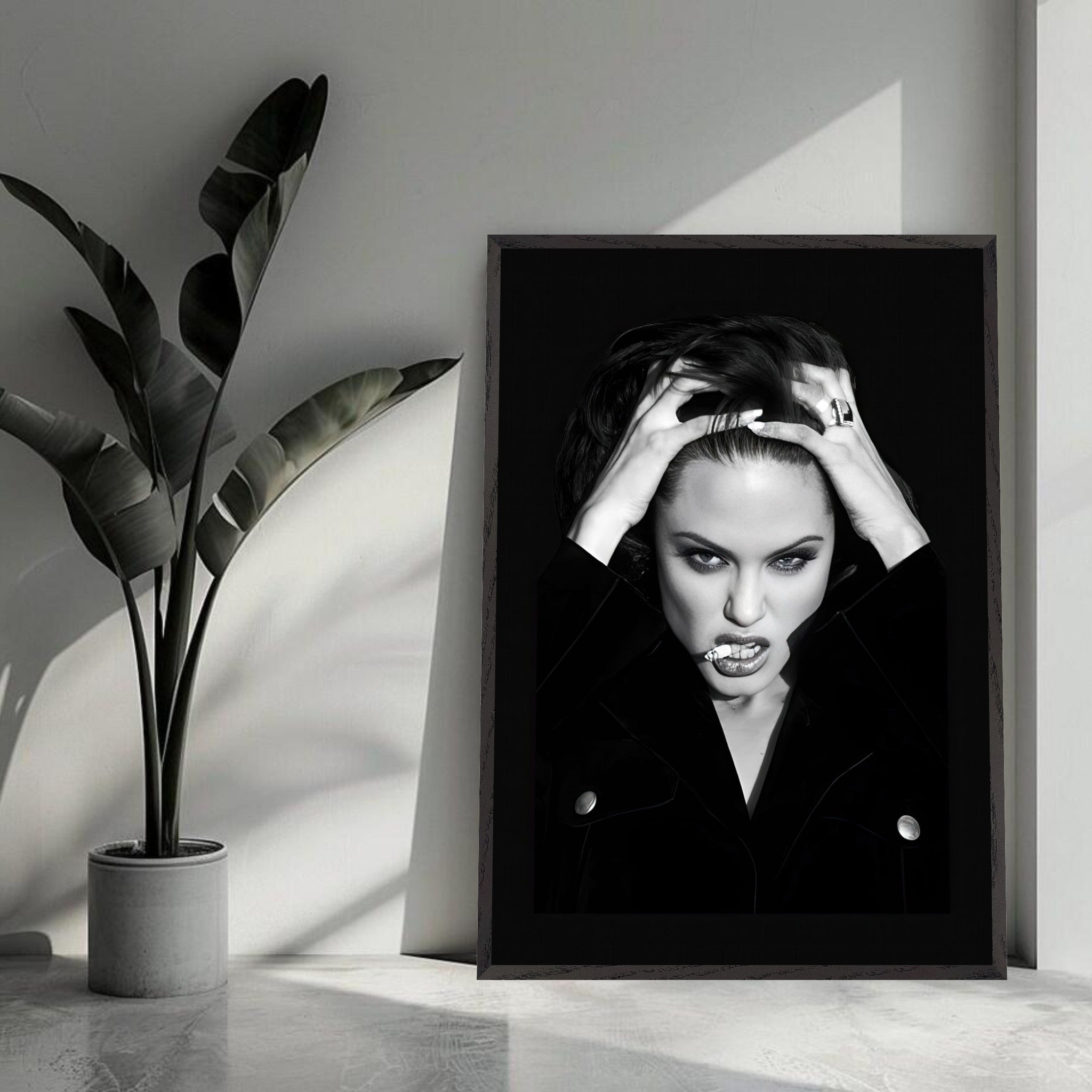 Angelina Jolie smoking vintage framed print showcasing her bold attitude in striking black and white. Perfect for art lovers.