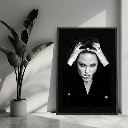 Angelina Jolie smoking vintage framed print showcasing her bold attitude in striking black and white. Perfect for art lovers.