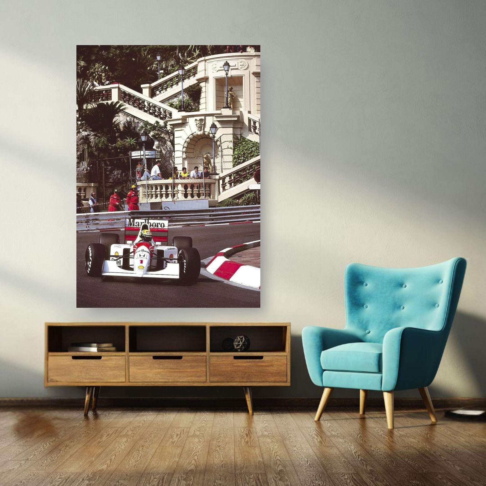 Ayrton Senna Monaco poster on wall in modern living room, showcasing F1 racing elegance and excitement.