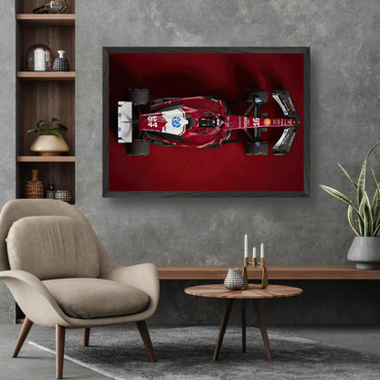 Framed Ferrari F1 2025 art against a red backdrop in a modern living room setting with stylish decor.