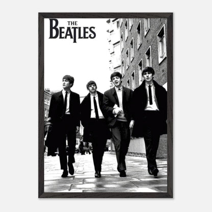 Vintage framed print of The Beatles walking down the street in black and white, capturing classic music history.