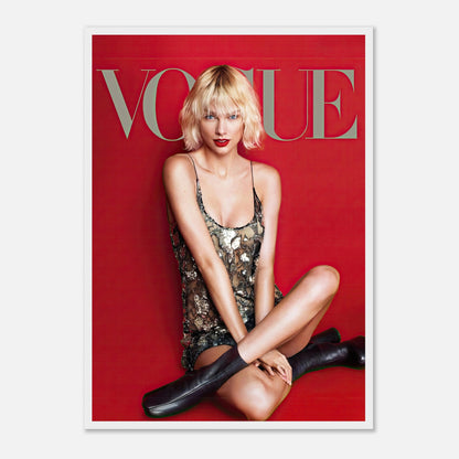 Taylor Swift Vogue framed poster featuring her in a sequined dress against a striking red backdrop. Timeless elegance and style.