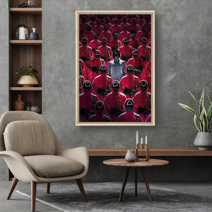 Framed canvas print of Squid Game guards in red uniforms, showcasing suspenseful artwork in modern living room decor.