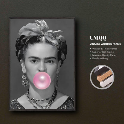 Frida Kahlo vintage framed art with bubble gum, black-and-white photograph in oak frame, ready to hang decor.