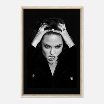 Angelina Jolie Smoking Framed Canvas Print showcasing elegance and rebellion with vibrant black and white details.