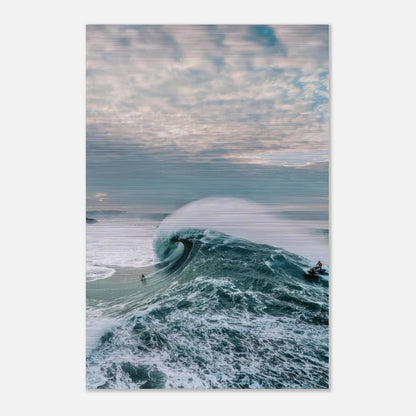 Fearless surfer riding a massive wave in a high-definition brushed metal print of big wave surfing.