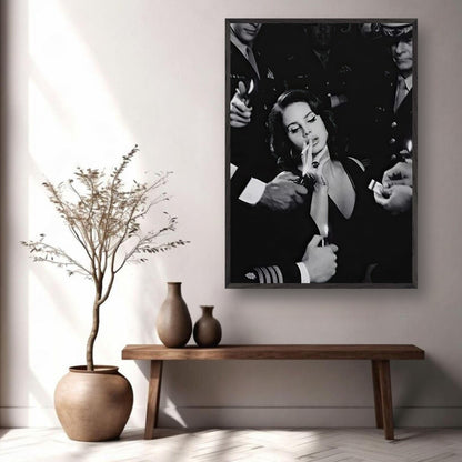 Lana Del Ray smoking framed print in a stylish interior, showcasing vintage black-and-white elegance and charm.