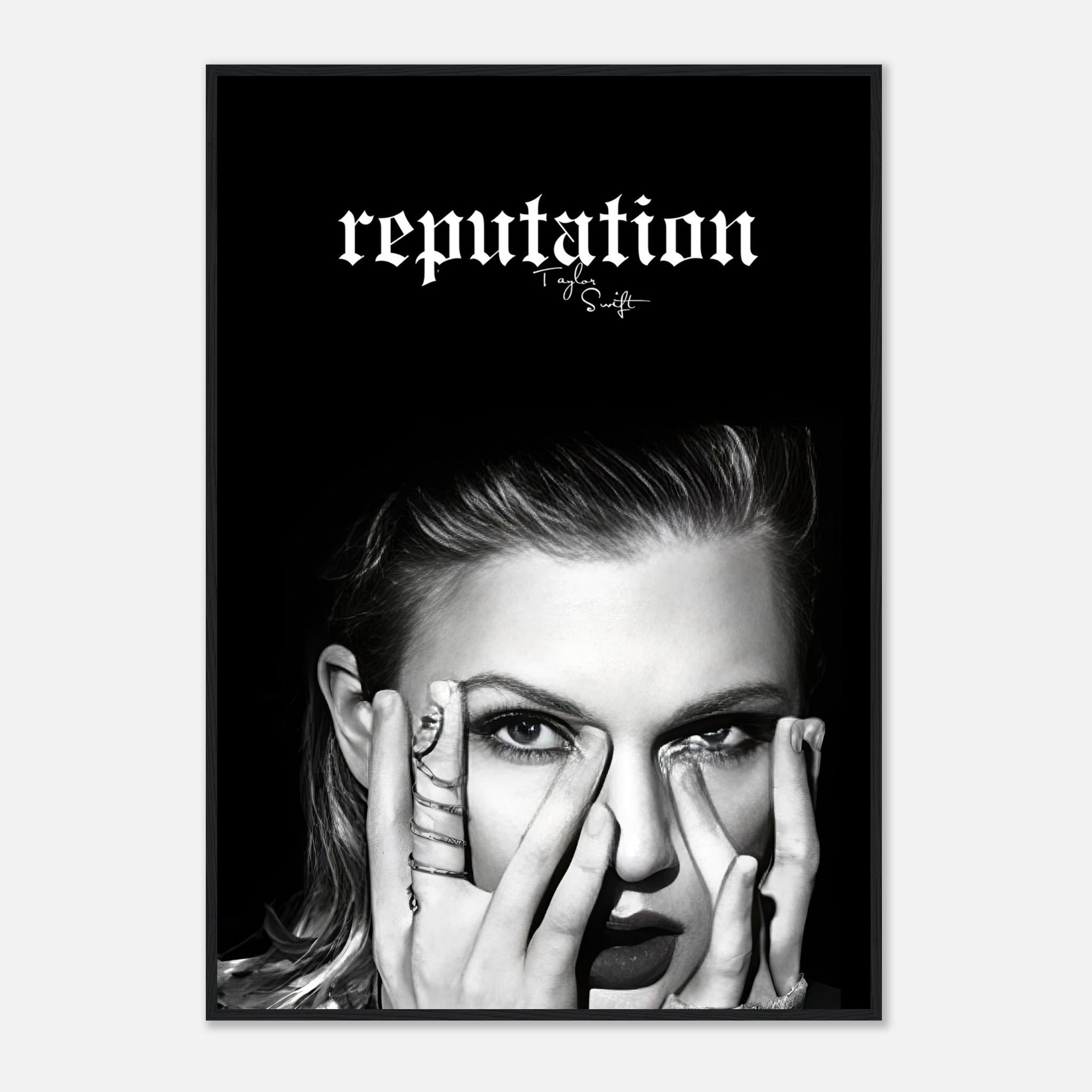 Taylor Swift Reputation framed print featuring striking black-and-white imagery and bold text for elegant decor.