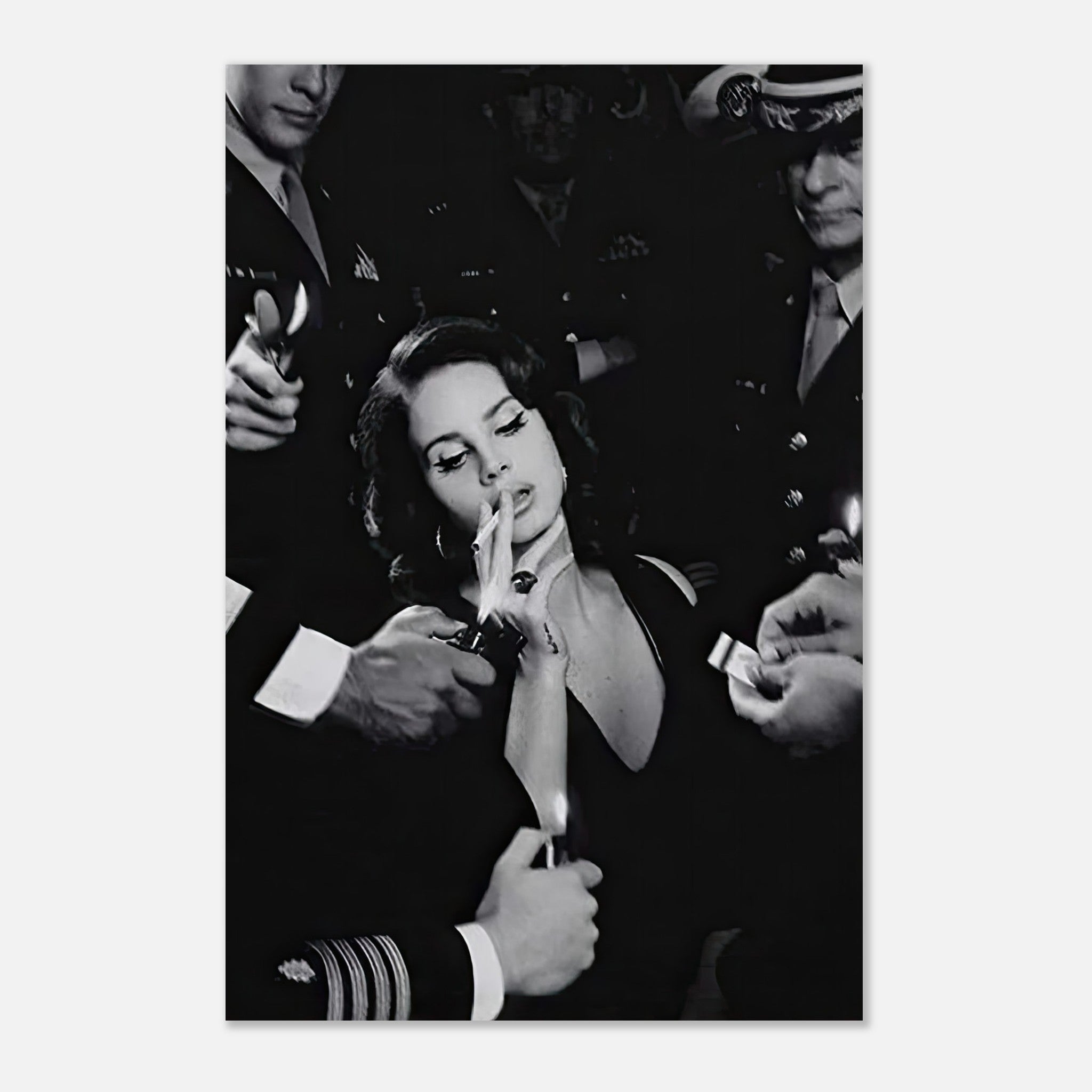 Lana Del Rey smoking in a cinematic black-and-white scene surrounded by men in uniform, evoking timeless allure.